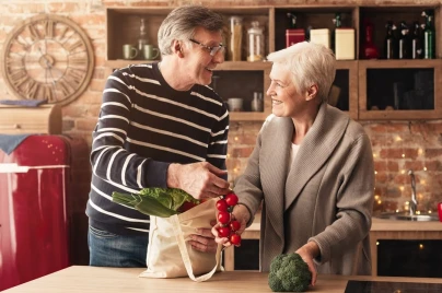 Old couple with groceries